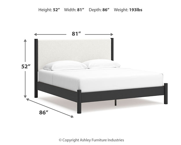 Cadmori King Upholstered Panel Bed with Mirrored Dresser